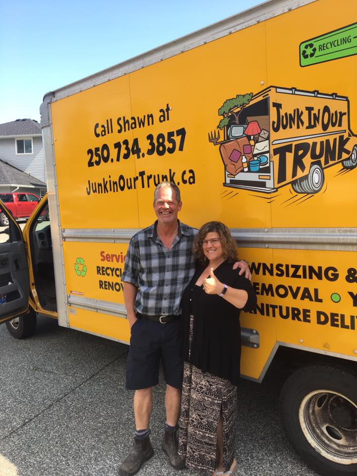Shawn with a happy Nanaimo customer giving a thumbs up beside the Junk In Our Trunk truck