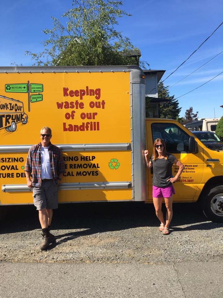Shawn and team member in front of the 'Keeping waste out of our landfill' truck